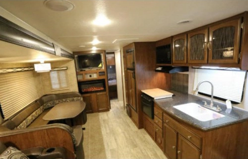 Coachmen Freedom Express Travel Trailer interior- living area and kitchen