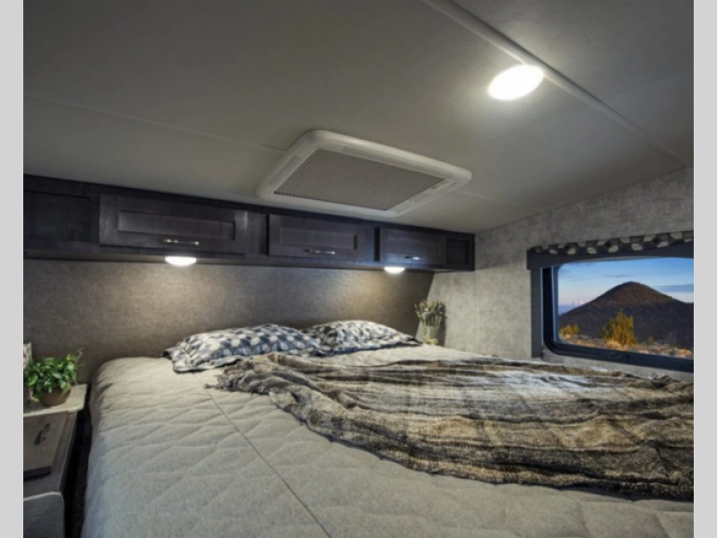 Eagle Cap truck camper- sleeping area with California King bed