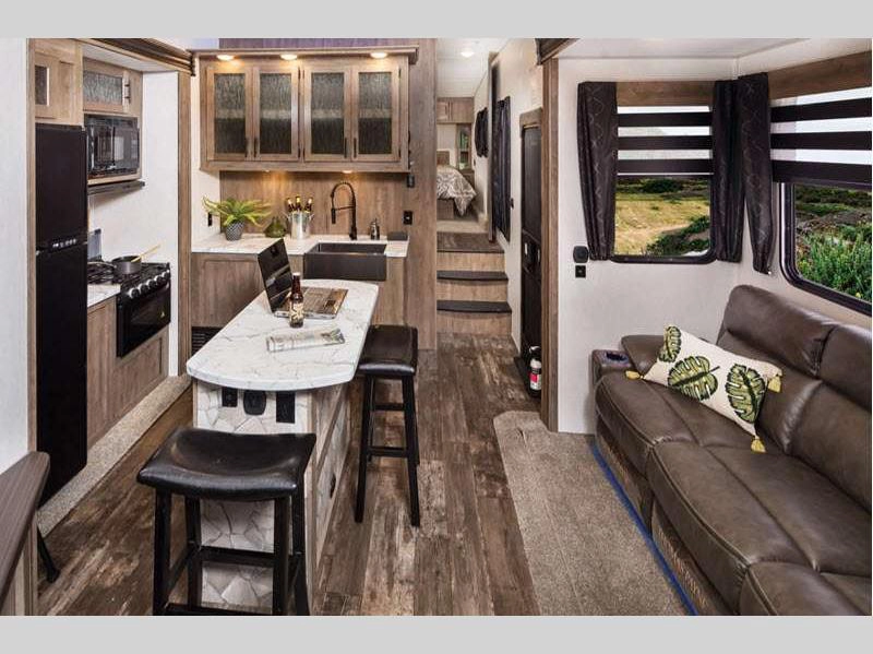 Cherokee Wolf Pack Toy Hauler- living room and kitchen area