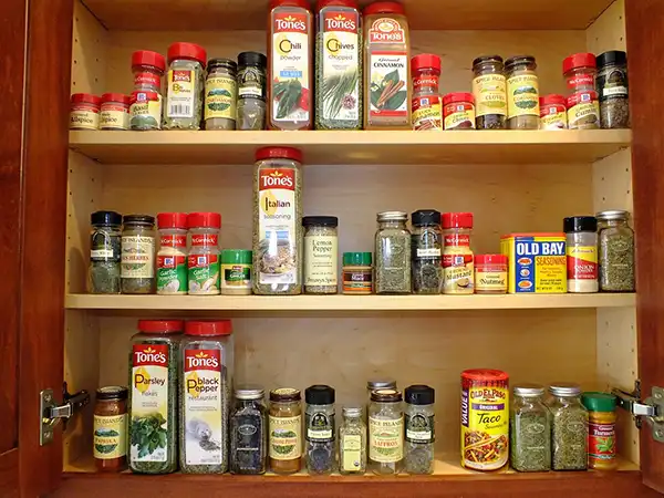 Spices and seasonings in cabinet