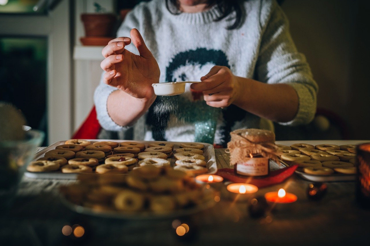 Person baking Christmas cookies