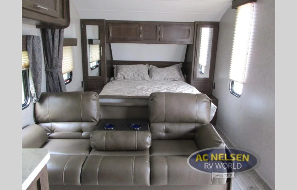 Forest River Patriot Edition RV- sofa and bedroom area